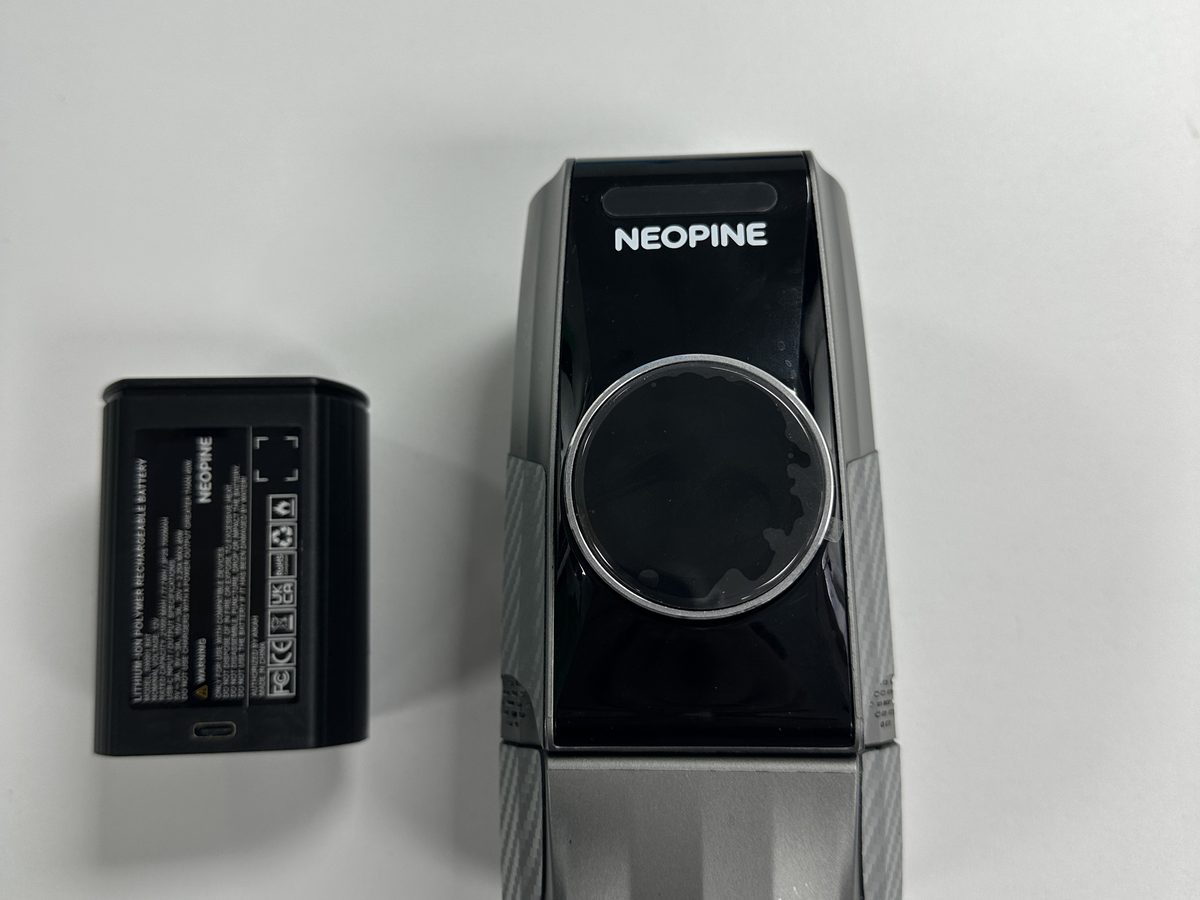NEOPINE Pro 2026 in Graphite Grey with its battery pack