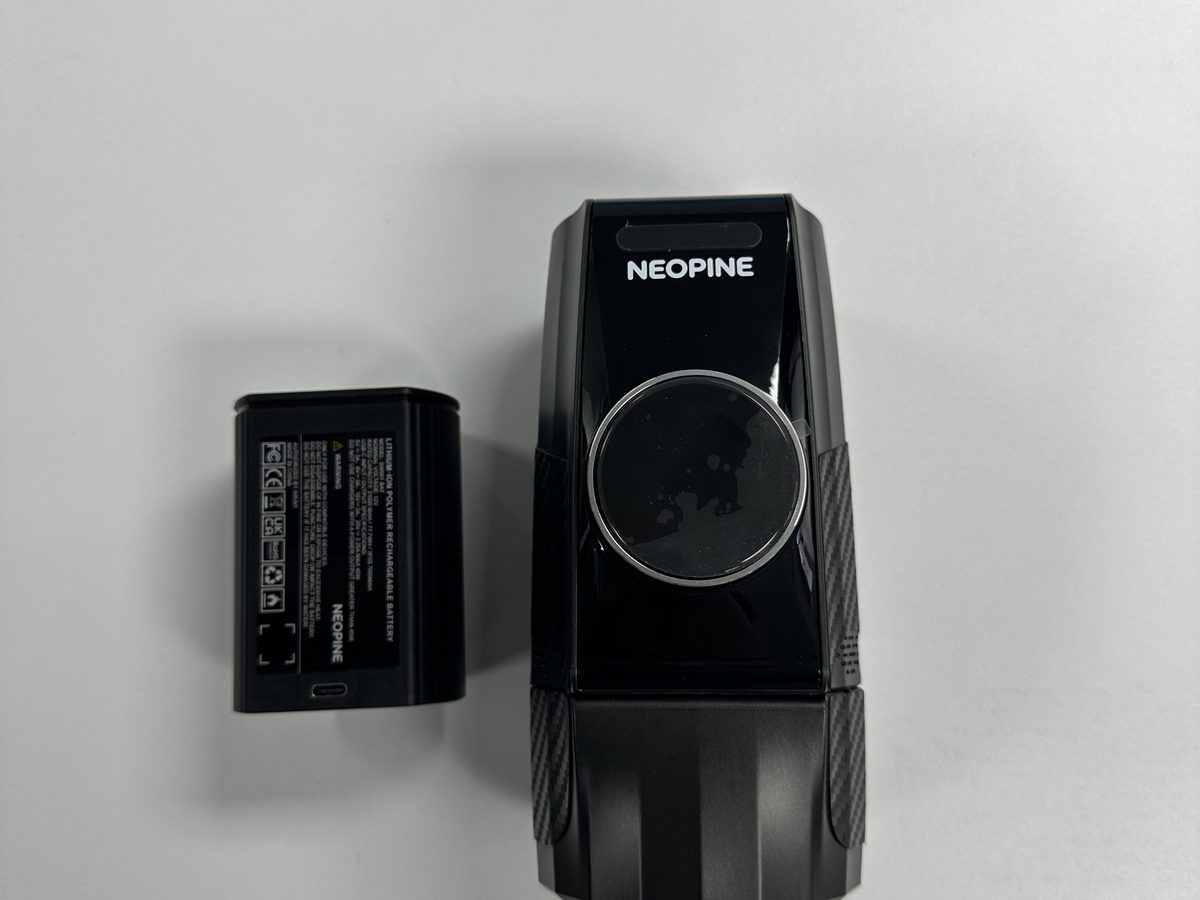 NEOPINE Pro 2026 in Onyx Black with its battery pack